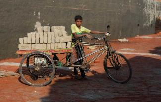 A boy working in brick production in Bangladesh.