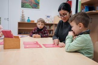 Teaching language skills in the nursery school St. Fronleichnam in Aachen, Germany.