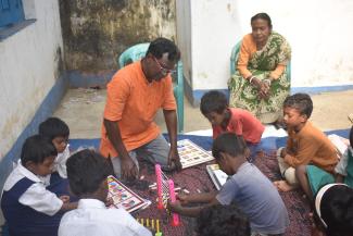 Maths lesson at a rural Santal pre-education centre.