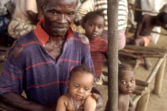 Old man and grandchild in Memieh Town, Liberia.