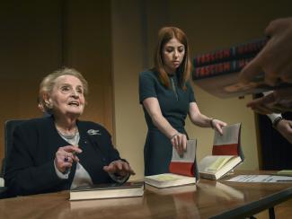 Madeleine Albright signing copies of her book in April 2018 in Washington.