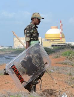 A policeman patrols the seashore near the Koodankulam nuclear plant in the south Indian State of Tamil Nadu.
