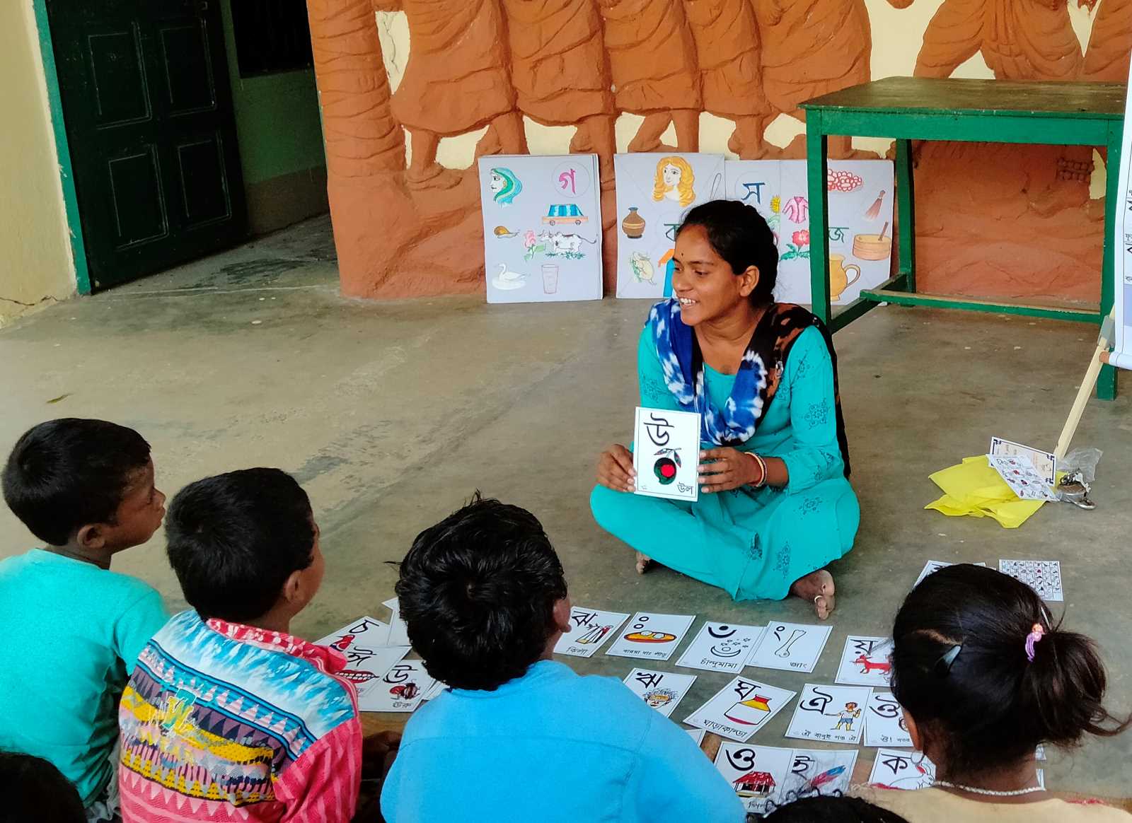 Boro Baski Santali-speaking children being educated in their native language in Bengali script.