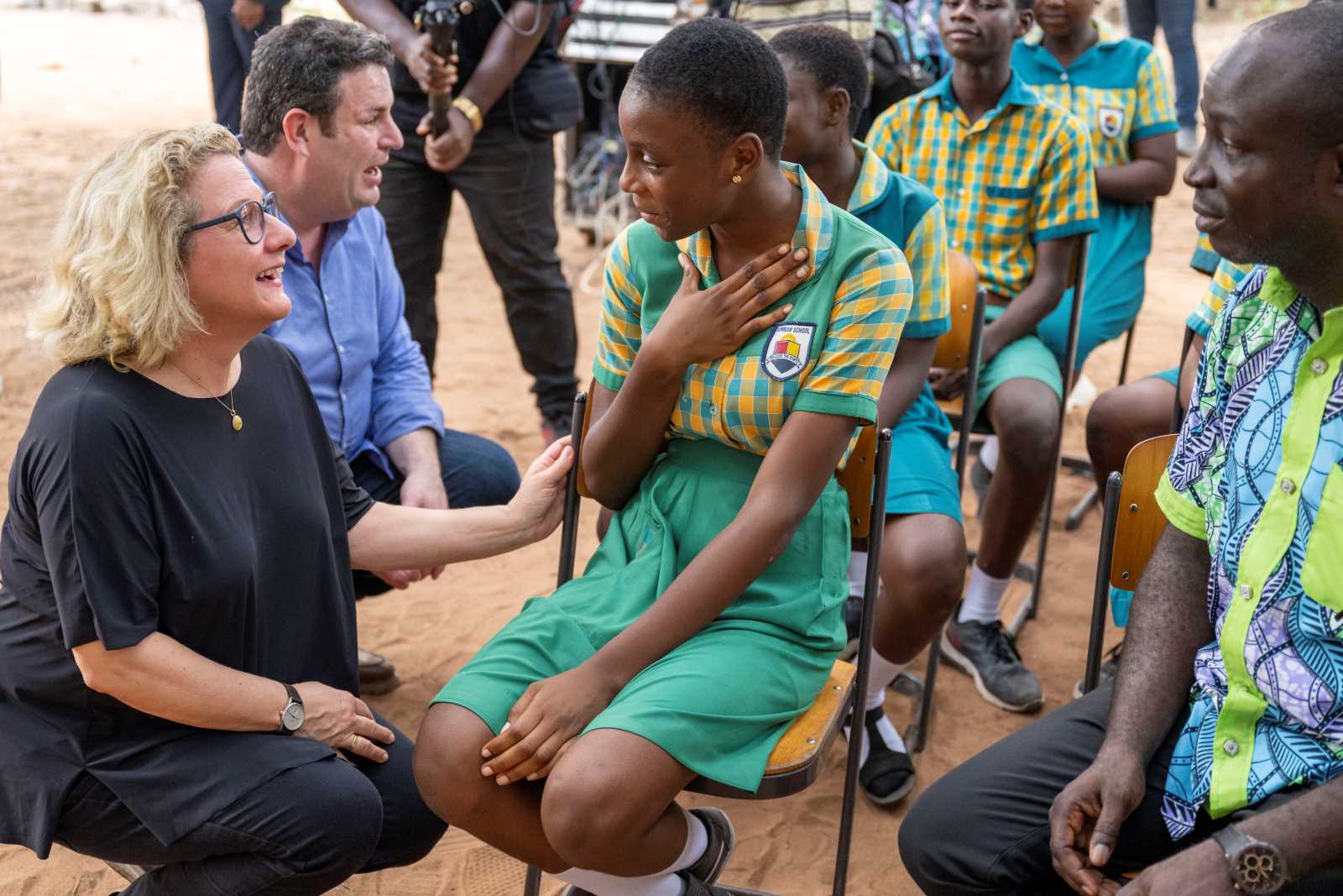 picture-alliance/dpa/Christophe Gateau Two German cabinet members visiting a Ghanaian NGO school in February: Svenja Schulze (in charge of international development) and Hubertus Heil (responsible for labour and social protection).
