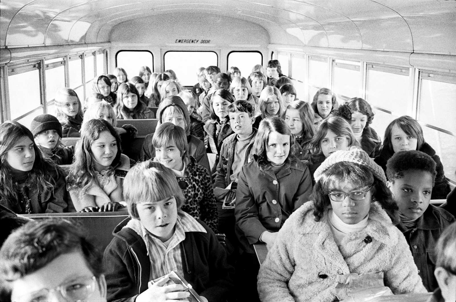 Black and white schoolchildren in a school bus in Charlotte, North Carolina, in 1973.