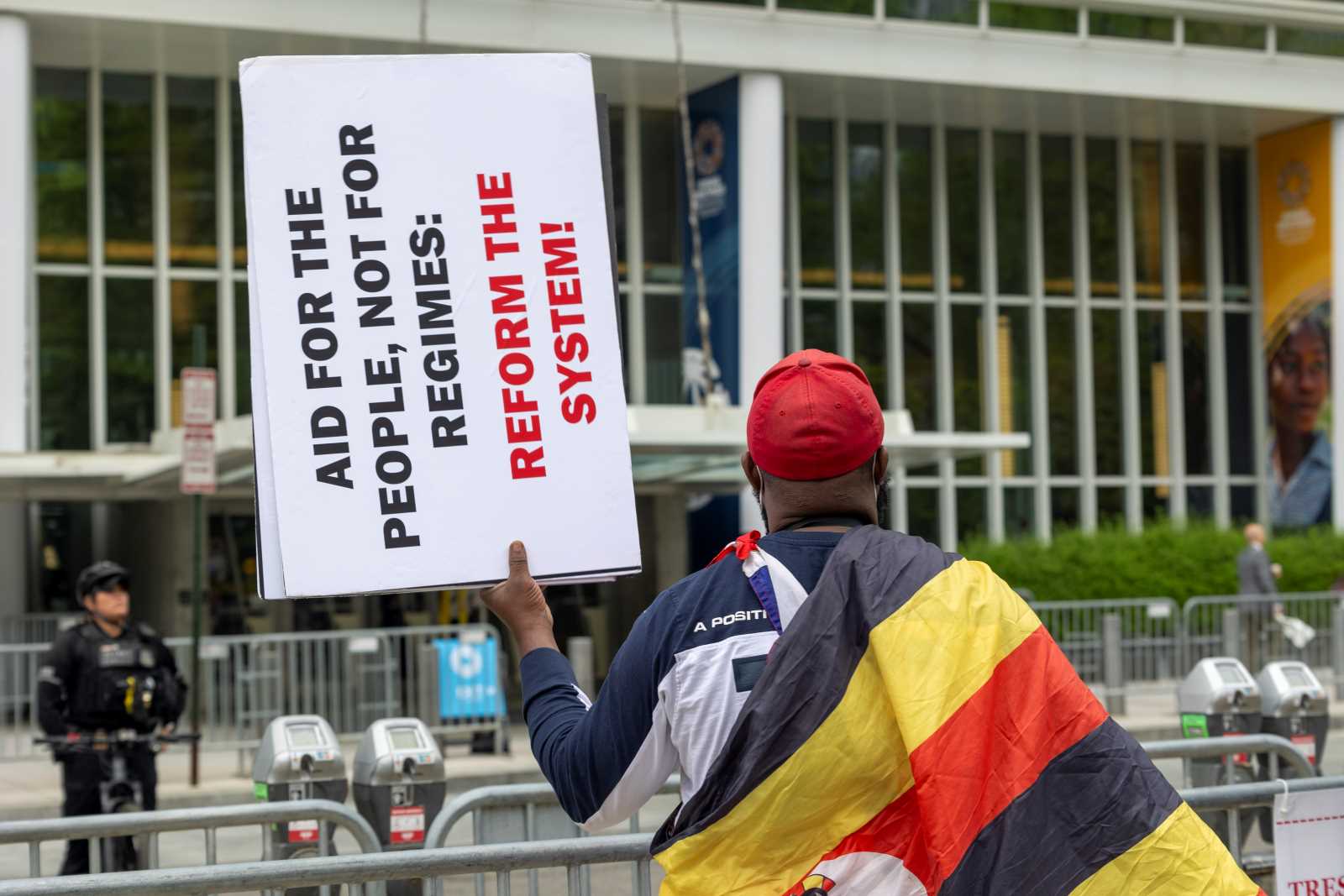 Ugandan demonstrator in front of the World Bank headquarters during a meeting with the IMF last year.