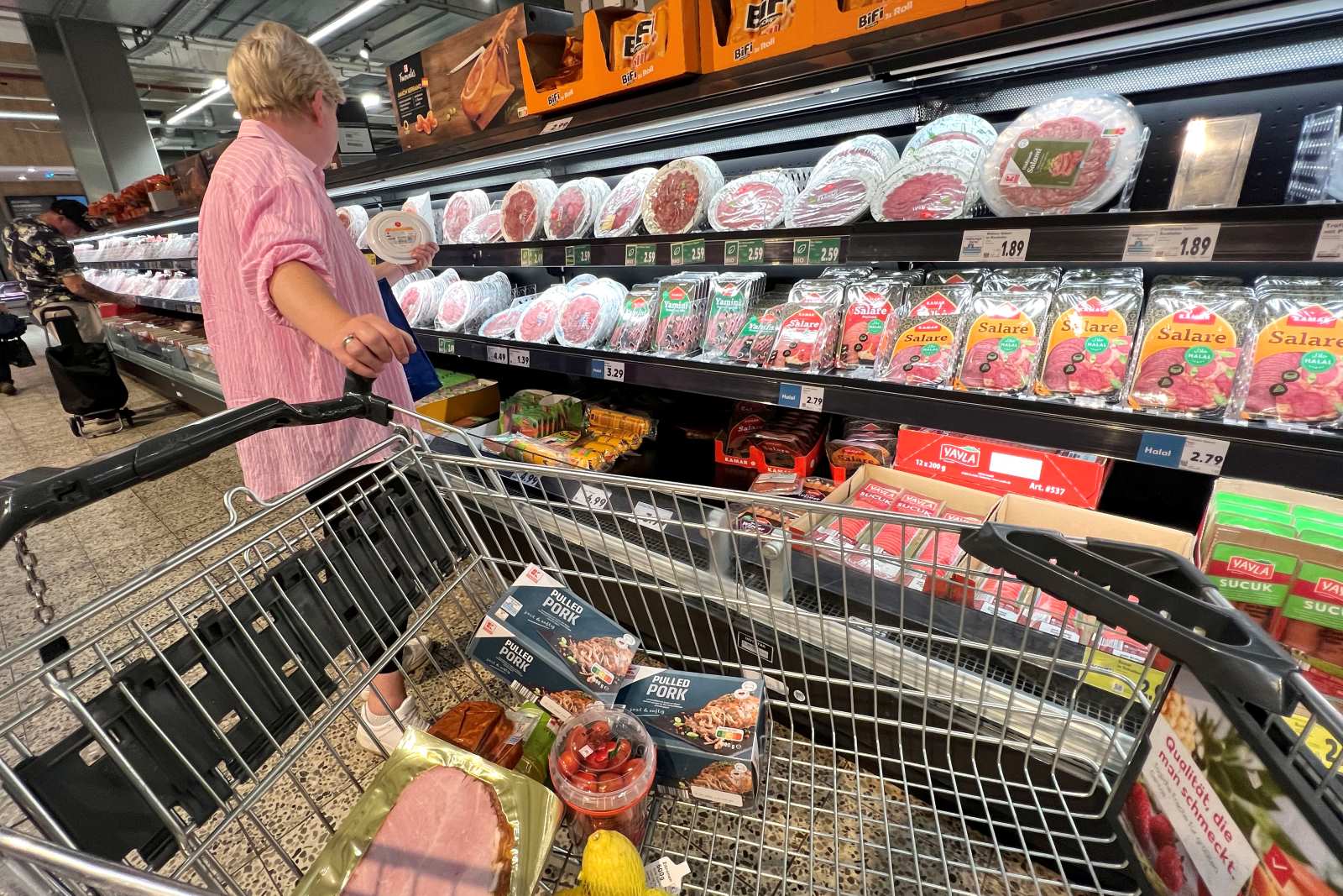 Consumer behaviour needs to change, especially in industrialised countries: cold cuts on display in a German supermarket.