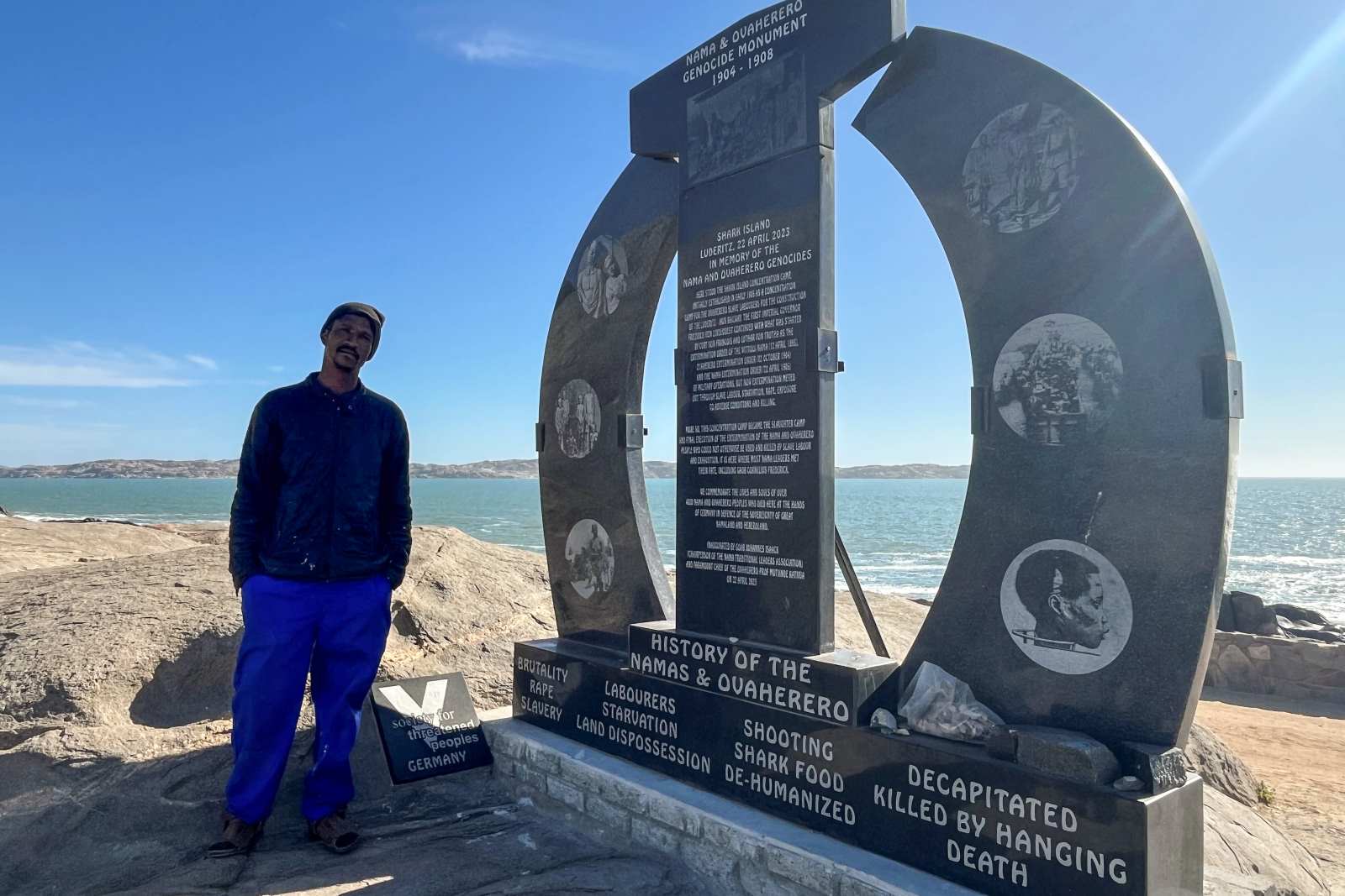 Memorial stone on Namibia’s Shark Island commemorating the Ovaherero-Nama genocide.