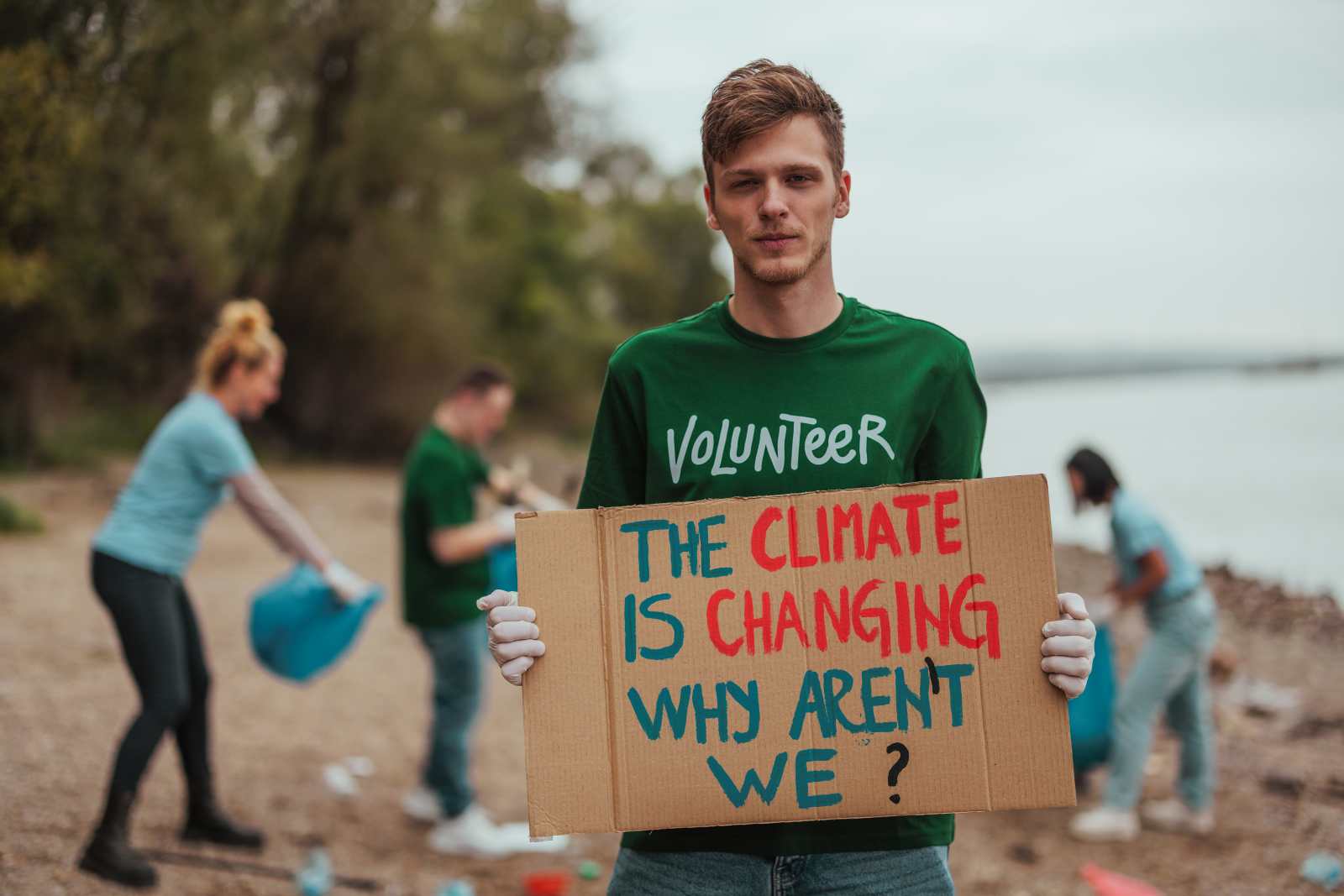 The climate is changing, why aren’t we? People at a river cleanup.