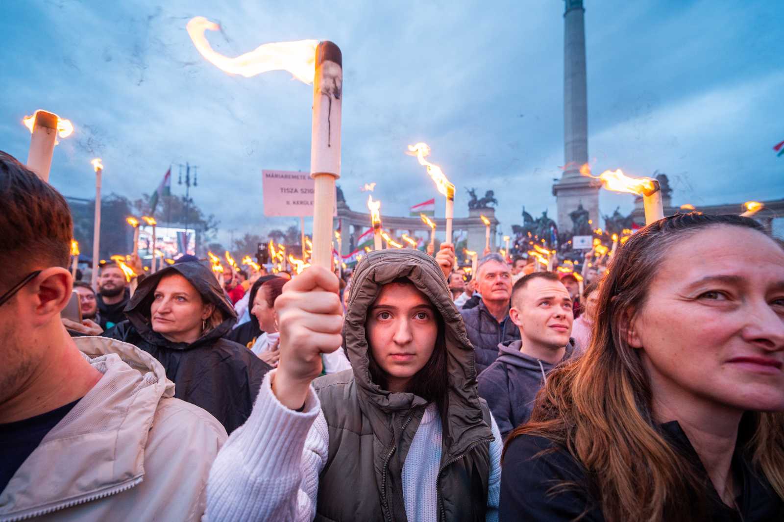 Supporters of Hungarian opposition leader Peter Magyar during a march to commemorate the 1956 Hungarian revolution in Budapest in 2025.