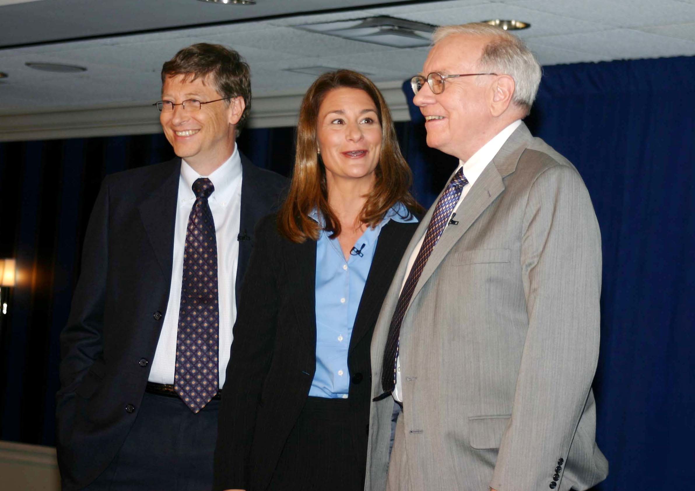 Anindito Mukherjee / picture-alliance / dpa Bill and Melinda Gates with Warren Buffett, who has also pledged billions to the Gates Foundation.