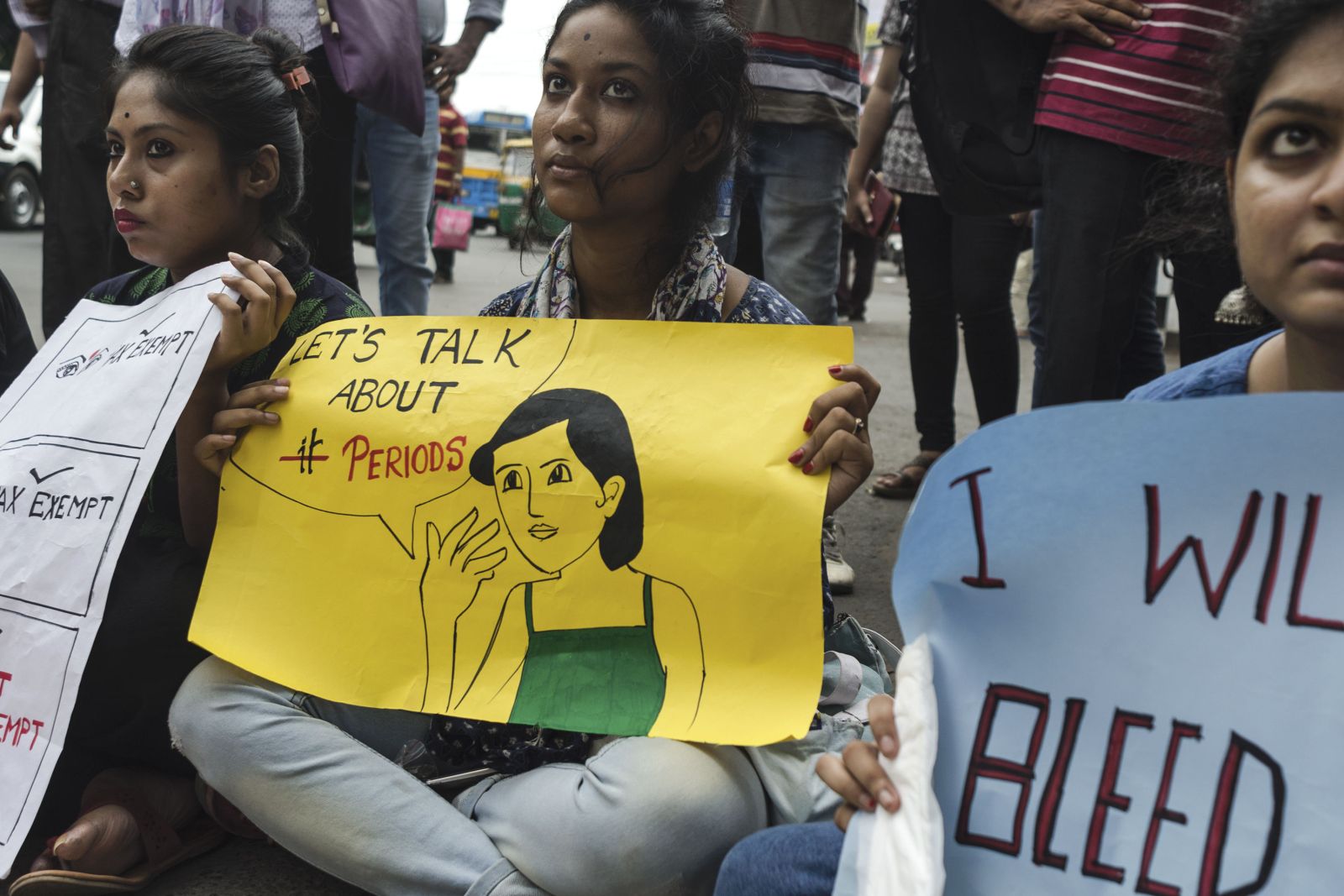 Women protest against the high cost of sanitary pads in Kolkata, India.