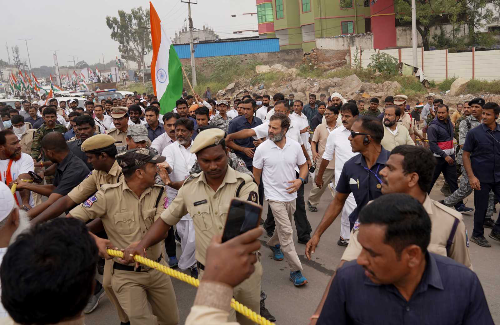 Rahul Gandhi (centre, blue shoes) and followers walking through Hyderabad in early November.