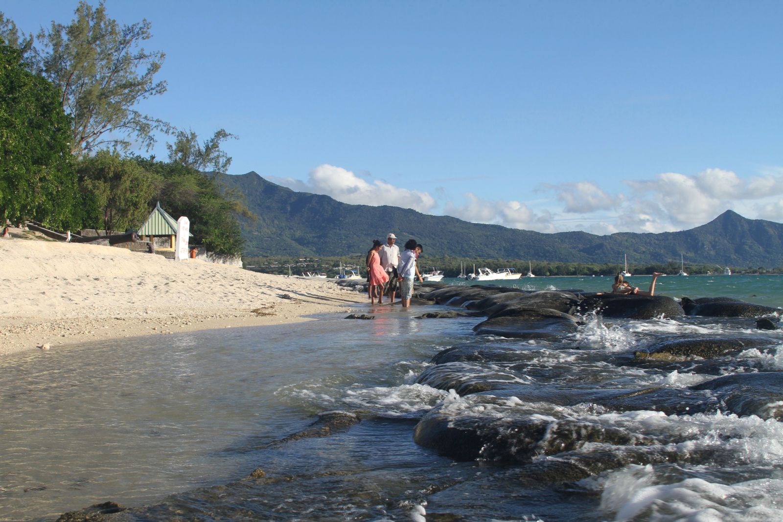 Mauritius is trying to fight beach erosion due to rising sea levels with sand bags.