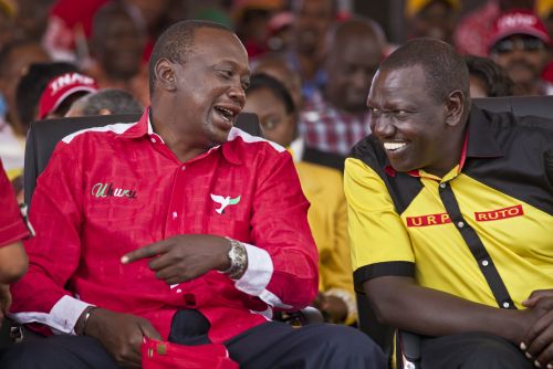 Now we are friends: Kenyatta (left) and Ruto at a campaign event shortly before the presidential elections in 2013.