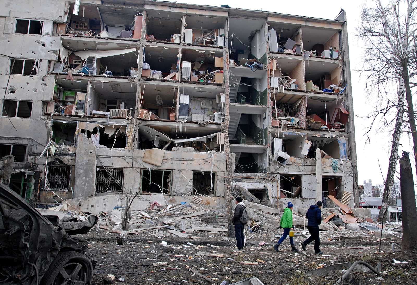 “Russia’s attack on Ukraine is atrocious. Full stop.” Destroyed apartment building in Kharkiv.
