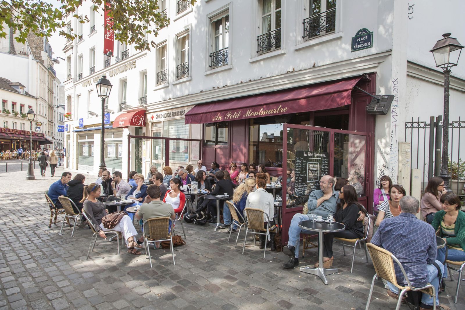 A café on the Place des Abesses, similar to many cafés where Parisians enjoyed their evening on 13 November 2015.