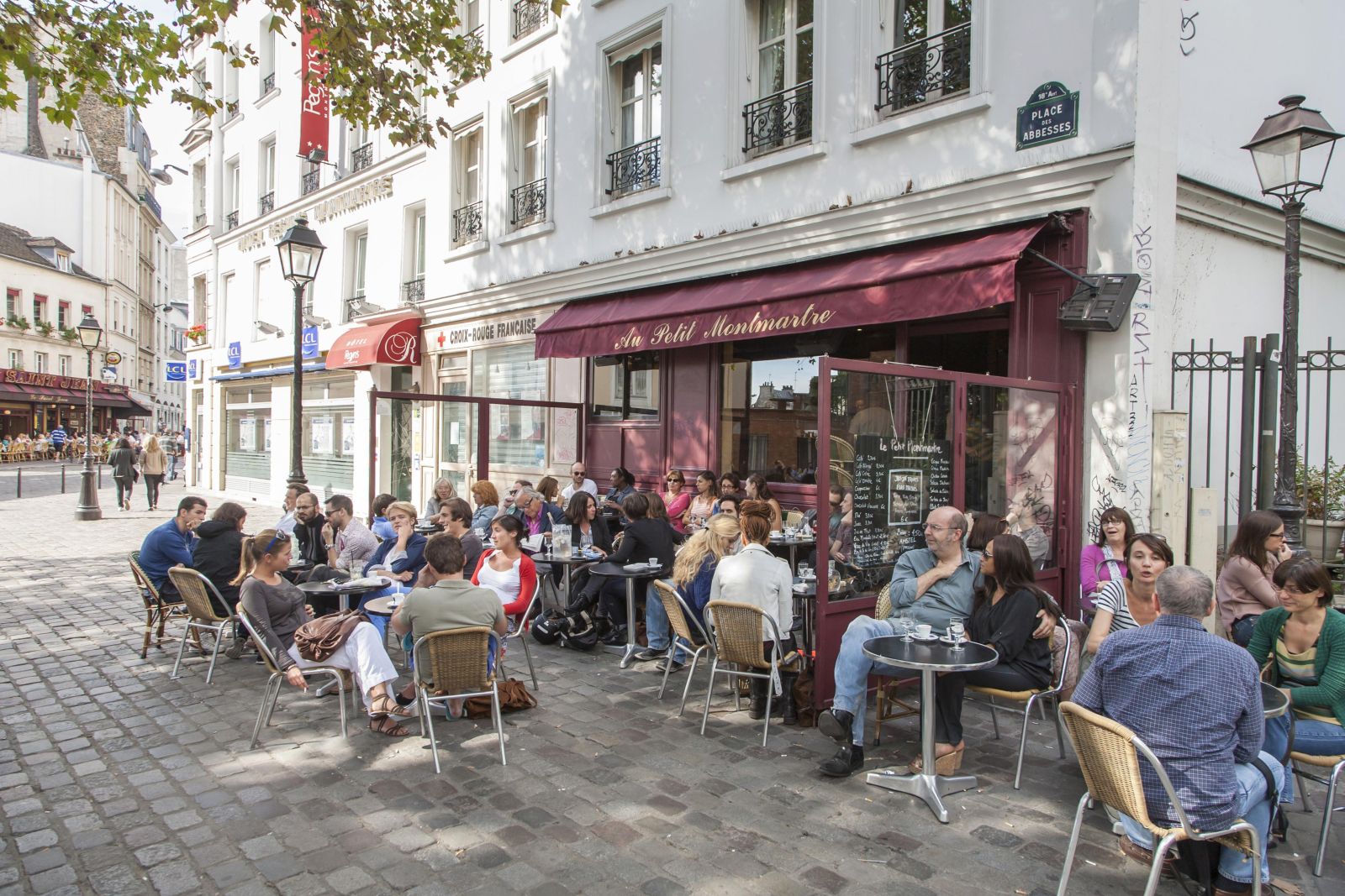 picture-alliance/imageBROKER A café on the Place des Abesses, similar to many cafés where Parisians enjoyed their evening on 13 November 2015.
