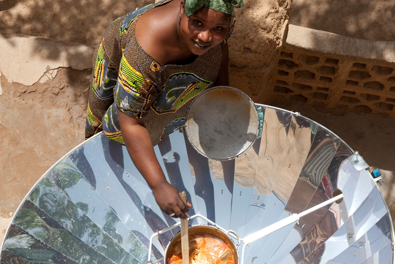 Many trees could be saved if all people used solar cookers instead of wood or coal like this woman in Mali.
