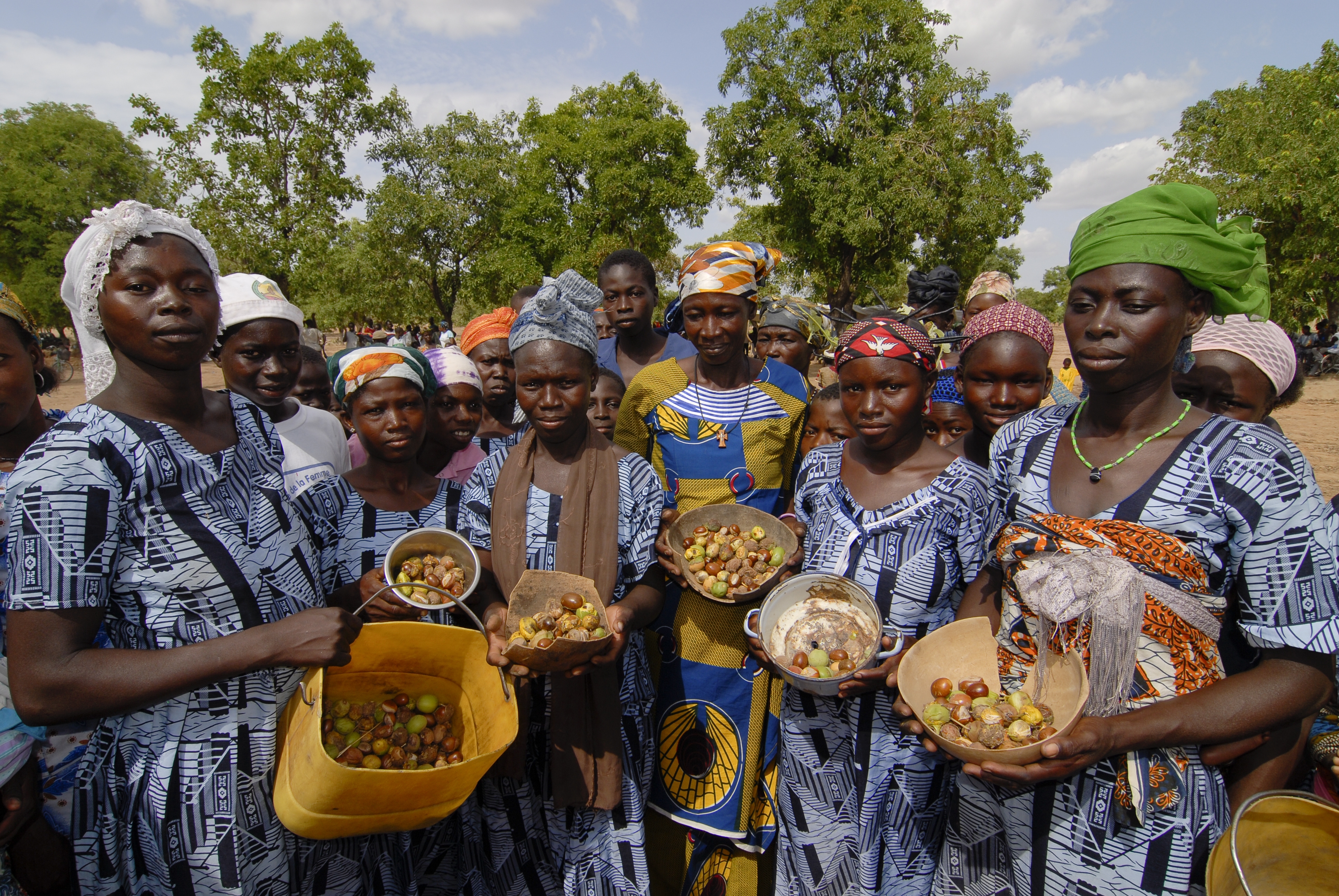 Böthling/photography Members of a women’s cooperative that produces shea butter from nuts in Burkina Faso.