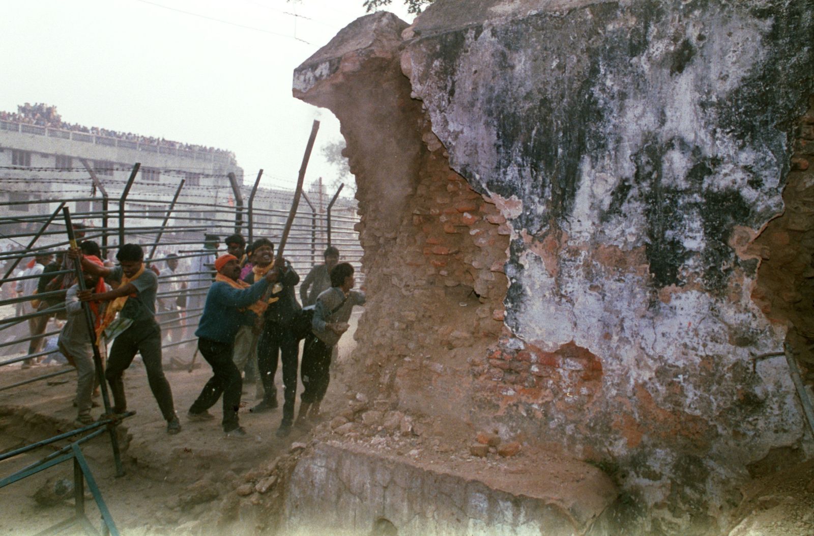 Hindu fanatics tearing down Babri Mosque in 1992.