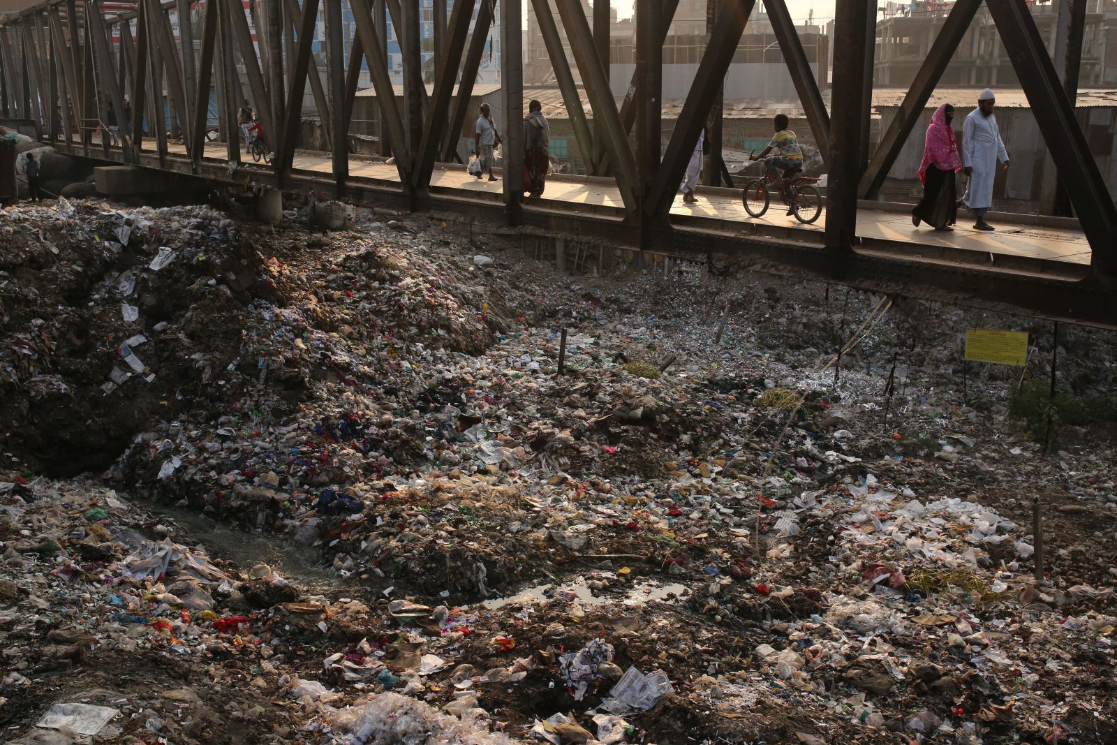 Plastic waste on a river bank in Dhaka, Bangladesh.