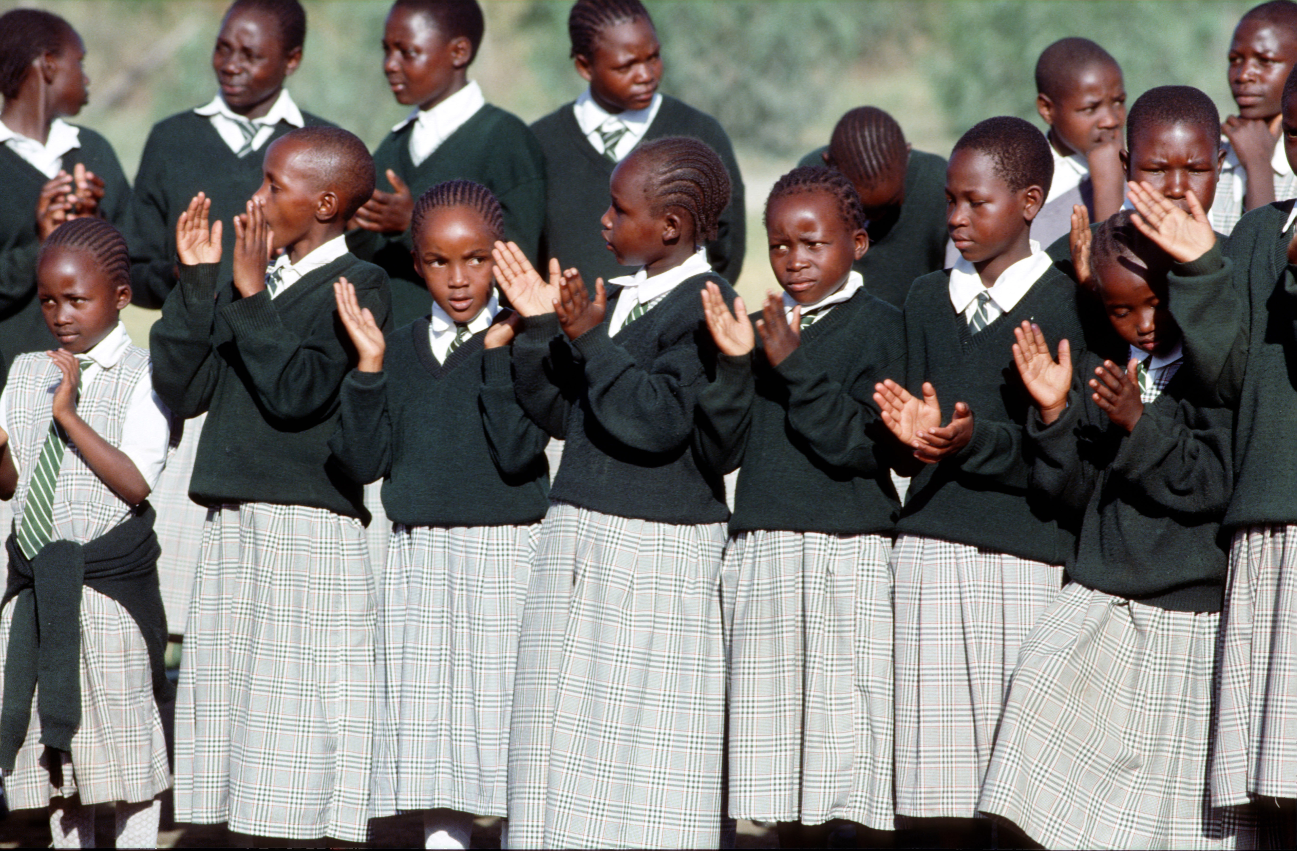 Global gender parity has been achieved in elementary education: Kenyan school girls.