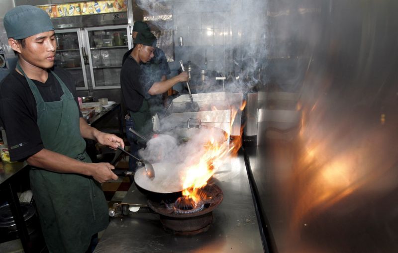 Mak Remissa/picture-alliance/dpa Mith Samlanh runs a restaurant in Phnom Penh, where former street children work as cooks or waiters.