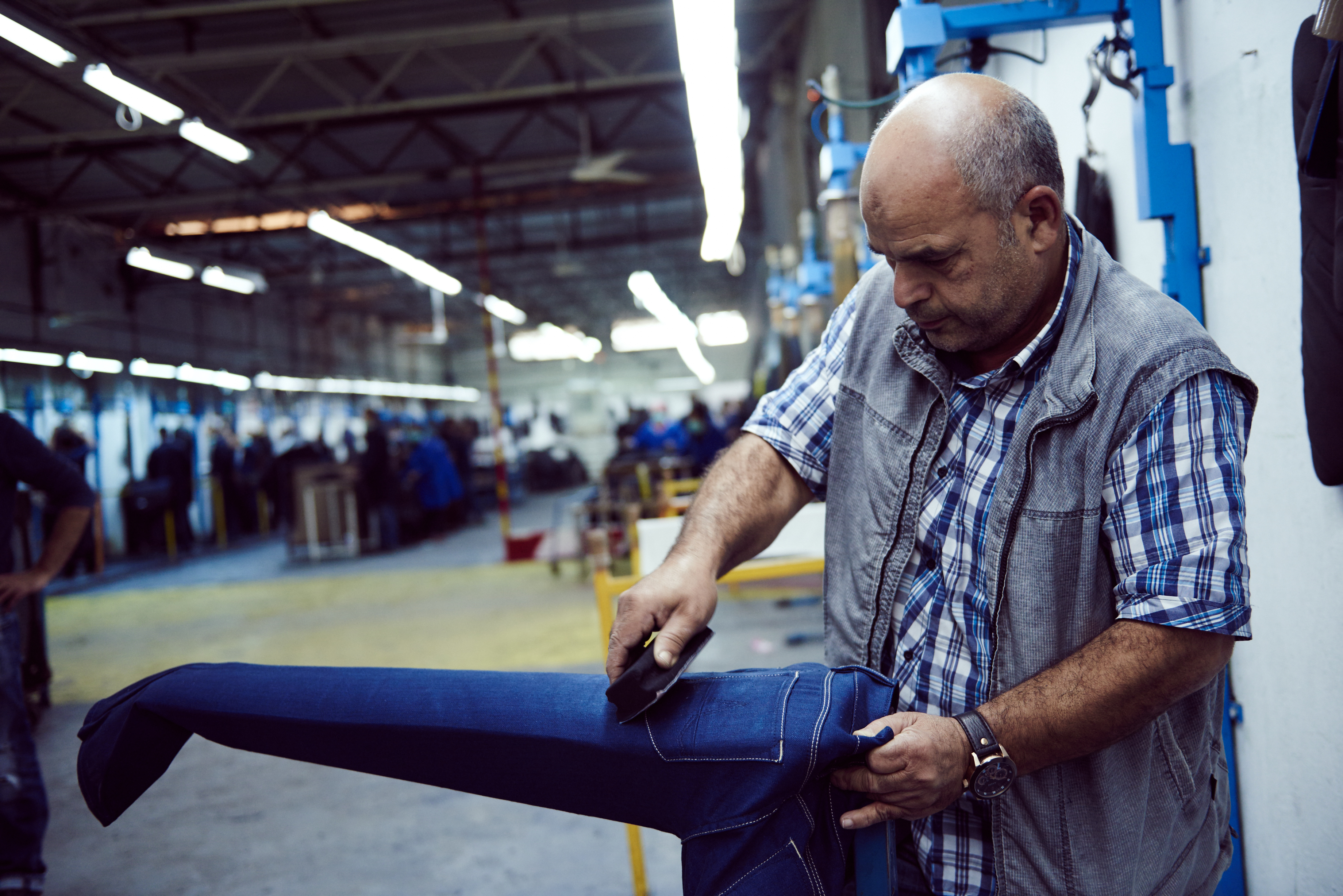 At Fashion Company Sahel in Tunisia, the denim fabric from the weaving factories is cut and sewn into jeans. The factory has been audited on behalf of Fair Wear Foundation (FWF) since ­December 2013.