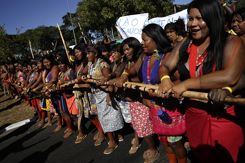 Eraldo Peres/picture-alliance/AP Photo Indigenous women rally for better health care in Brasília, the capital of Brazil, in August 2019.