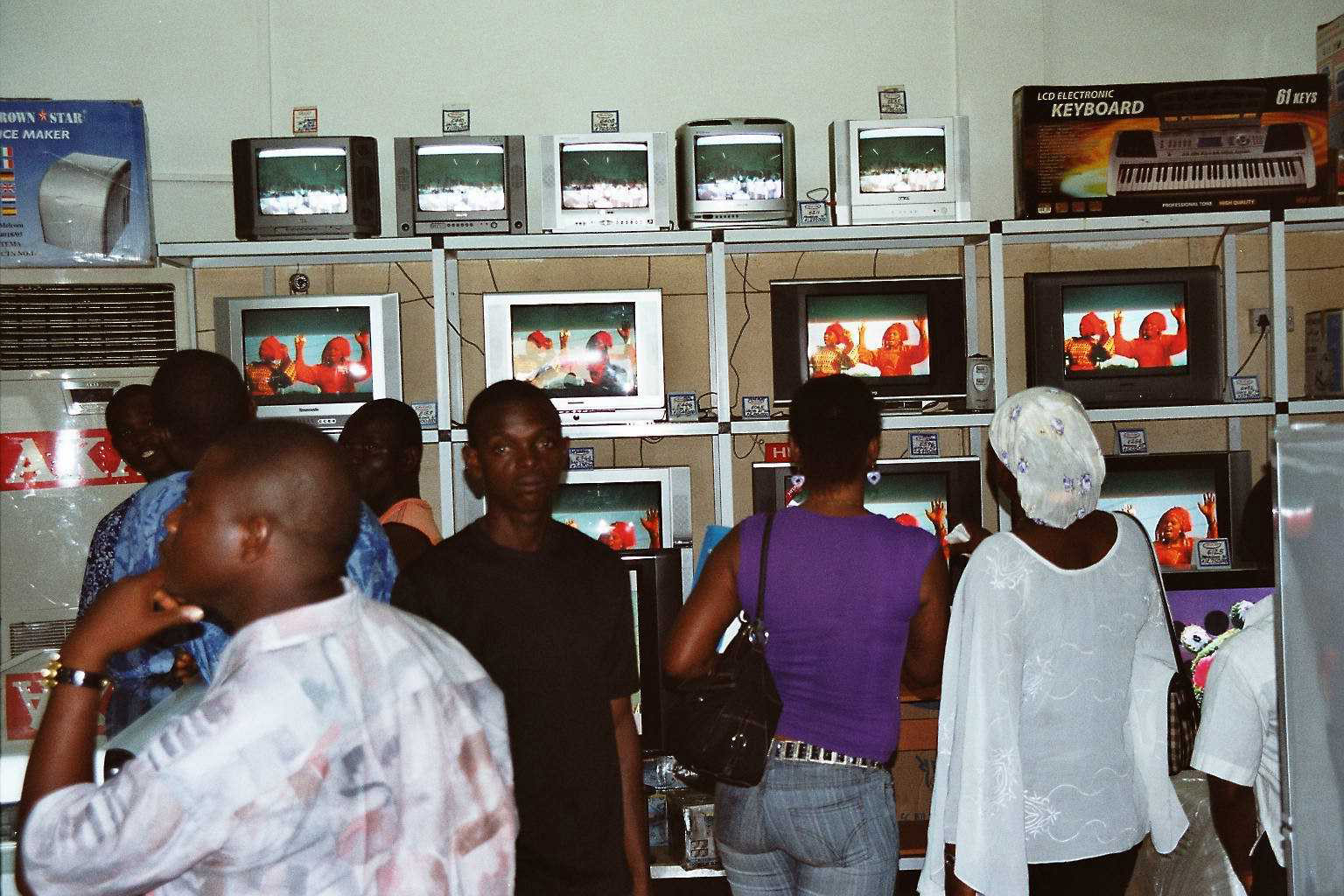 Increasing purchasing power: shoppers in the electronic goods department of a store in Accra in 2007.