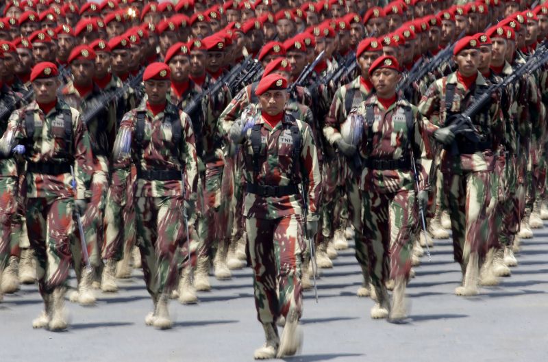 Members of the Indonesian Army Special Forces Commandos march during a parade.