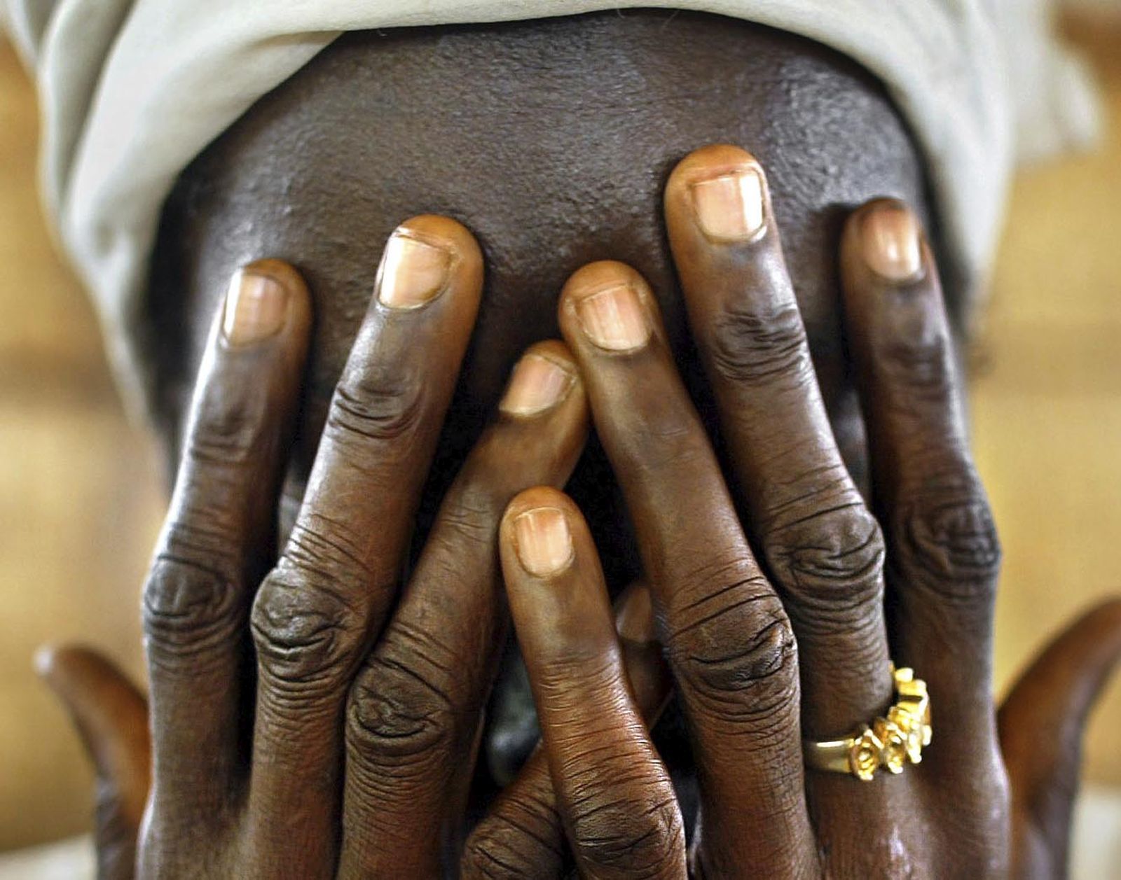 picture alliance/AP Photo Traumatic events often lead to psychological suffering: rape victim from Liberia.
