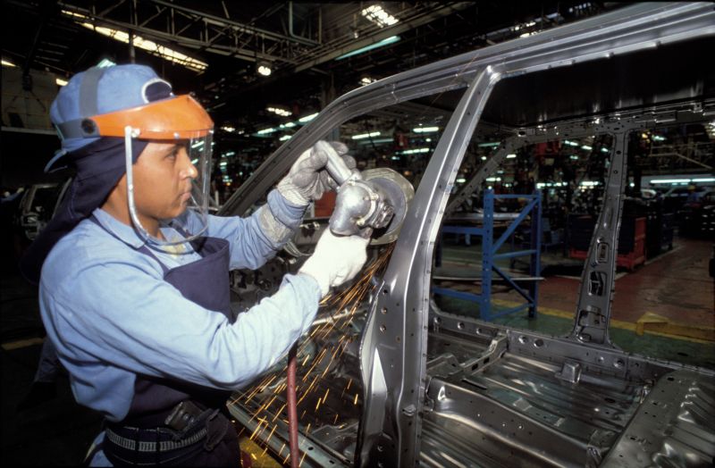 The lack of skilled and specialised workers is particularly evident in advanced manufacturing and high-tech industries: employee in a Nissan car factory in Guernavaca, Mexico.