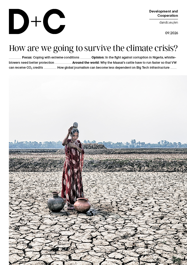 “D+C” magazine cover (09/2026) titled “How are we going to survive the climate crisis?” showing a woman on cracked, dried ground beside water pots.