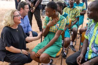 picture-alliance/dpa/Christophe Gateau Two German cabinet members visiting a Ghanaian NGO school in February: Svenja Schulze (in charge of international development) and Hubertus Heil (responsible for labour and social protection).