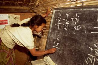 A woman in a female literacy class in Dhankuta, Nepal.