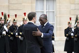Benin’s President Talon is welcomed by French President Macron in March in Paris. 