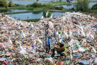 Informal Indonesian waste picker.