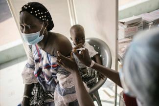  Many Africans were frustrated because Covid-19 vaccines did not become available faster: a Senegalese woman getting a shot in Dakar in November 2021. 