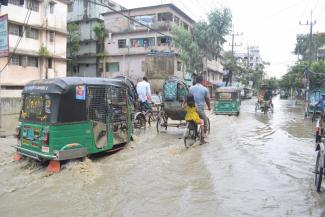 Rafiqul Islam Montu The main street of a formerly upmarket residential area is under water almost every day.