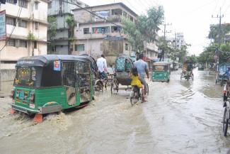 The main street of a formerly upmarket residential area is under water almost every day.