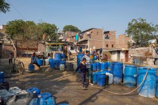 Water supply in the Baljeet Nagar slum, New Delhi.