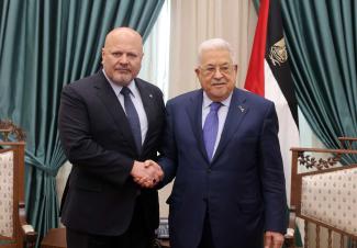 Karim Khan, the International Criminal Court’s prosecutor, visiting President Mahmoud Abbas of the Palestinian Authority in Ramallah in early December.