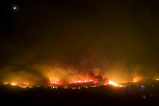 picture alliance/dpa / Christoph Reichwein Wildfire on Rhodes, the Greek island, in summer 2023.