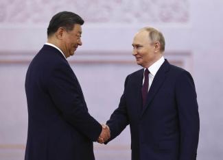 Russian President Vladimir Putin and his Chinese counterpart Xi Jinping support one another.