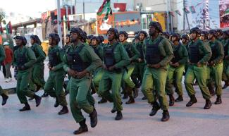 picture alliance/abaca/AA/ABACA Soldiers parade in Tripoli in February as part of the celebrations to mark the 14th anniversary of the February 17 Revolution that led to the overthrow of the Gaddafi regime.