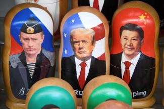 Russian wooden dolls called Matryoshka depicting Russian President Vladimir Putin, US President Donald Trump and China’s President Xi Jinping at a souvenir shop in Moscow.