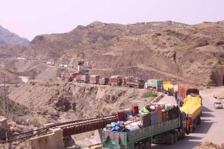 Afghan refugees leaving Pakistan at the Torkham border crossing in November 2025.