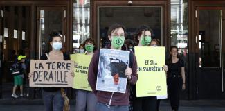 Climate protesters with Covid-19-masks in Lausanne in late May.